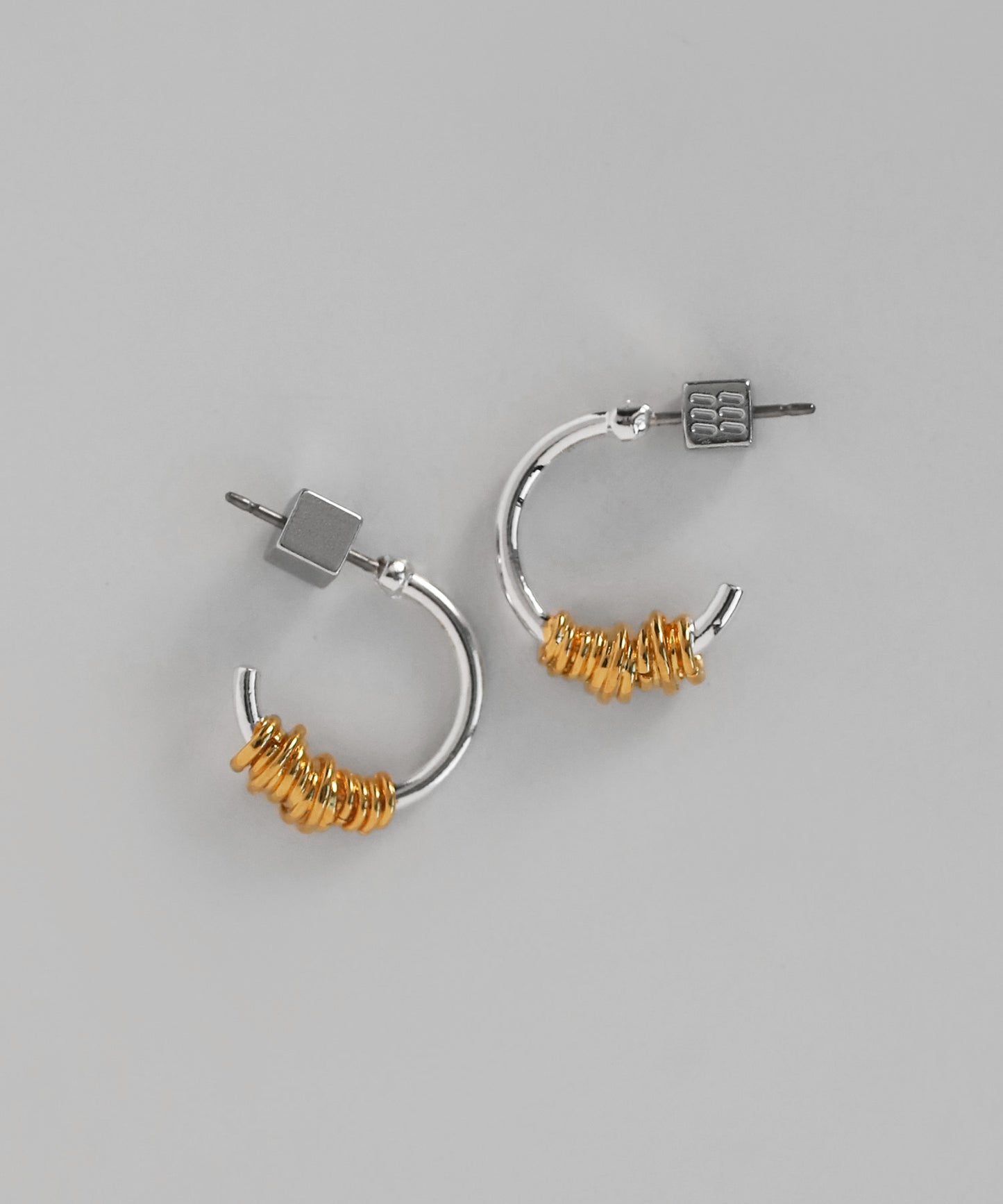 Mixed-Metal Coil Design Hoop Earrings